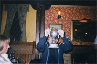 Allan Ellis raising his trophy