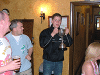 Rammer Dammer Ding Dong has a drink from the cup